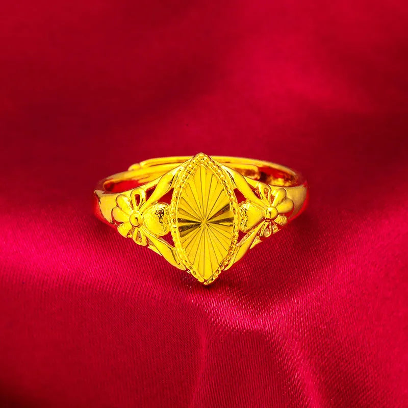 Open diamond flower ring in gold colour with geometric shape and textured details