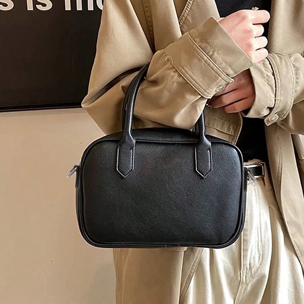 Retro square messenger bag in black with single shoulder strap