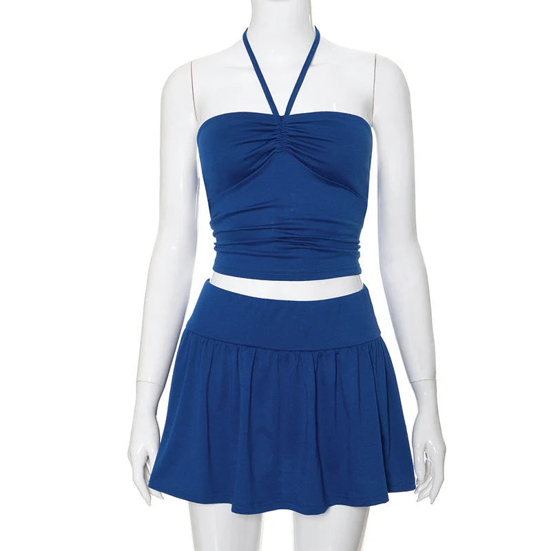 Women's sleeveless tube top and pleated skirt set in various colours