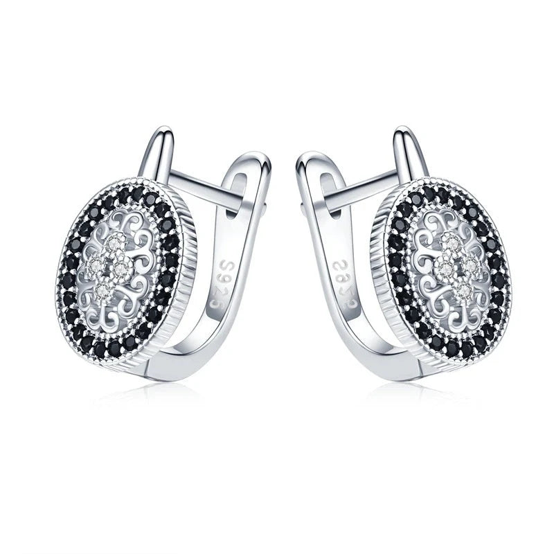 Copper plated earrings with refined rhinestone accents in black