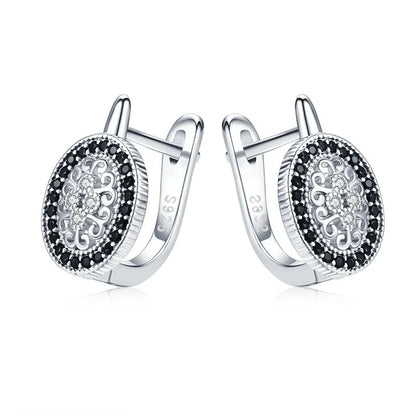 Copper plated earrings with refined rhinestone accents in black