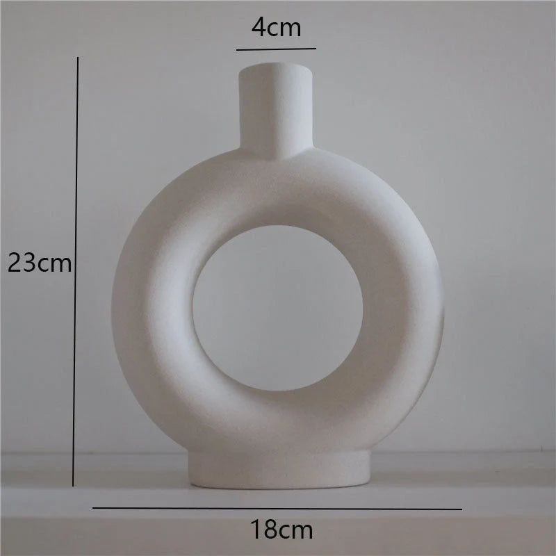 Minimalist ceramic vase set for modern home decoration, perfect for dry flower arrangements.