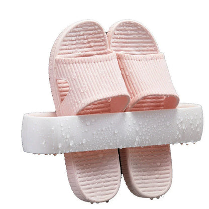 Wall-mounted bathroom slippers in pink, blue, and grey, made from 100% new plastic materials