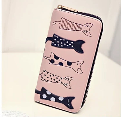 Black women's fashion wallet open showing six card slots and zipped note compartment, 10 cm wide genuine leather