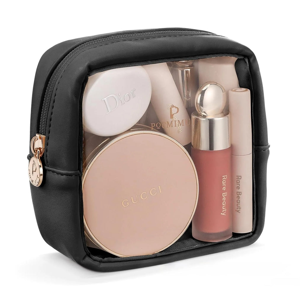 Clear PVC cosmetic bag with a zip open, showing a polyester lining and separate compartments.