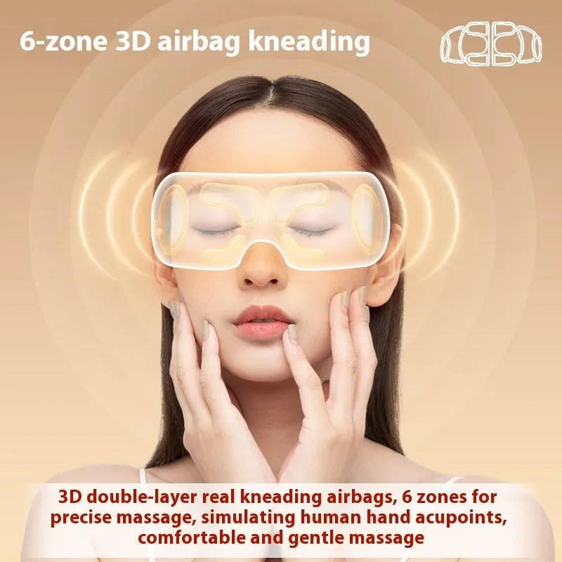 White rechargeable airbag massage eye massager with hot compress function on grey background