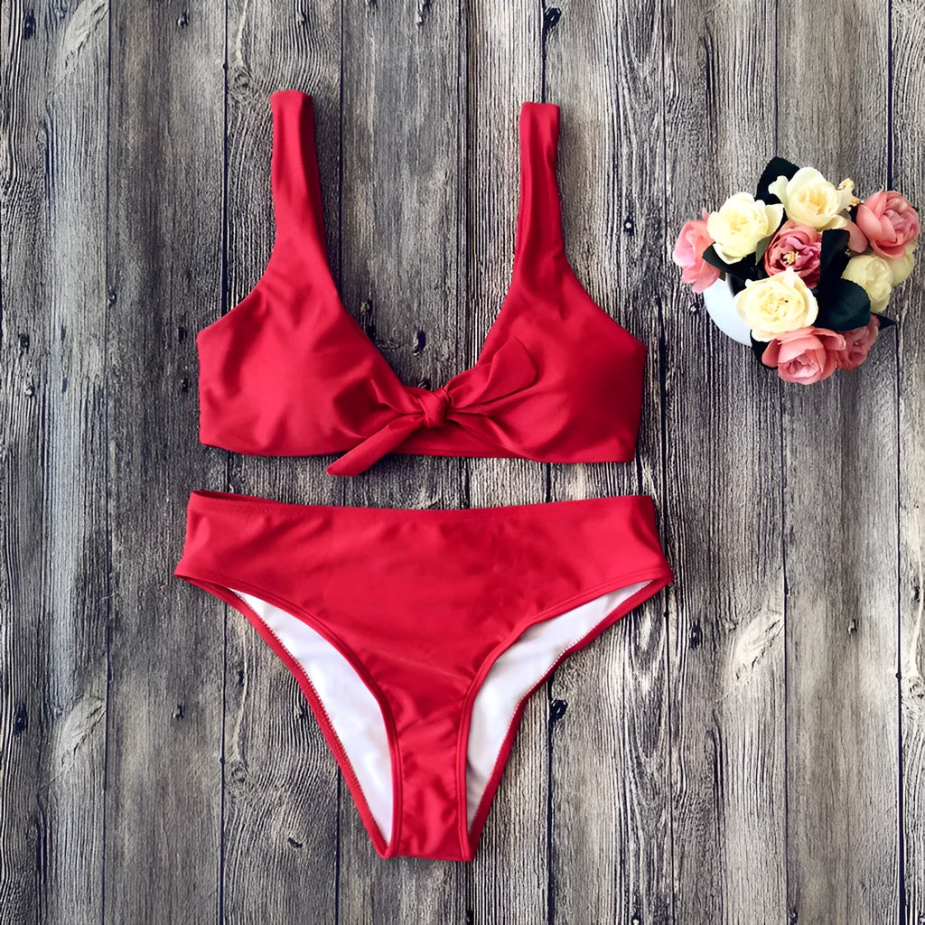 Women's polyester bikini set in black, pink, red, white or wine red with matching bra and panties