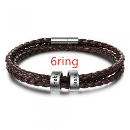 Personalized braided leather bracelet with engraved charm for men, available in black, brown, and navy colors