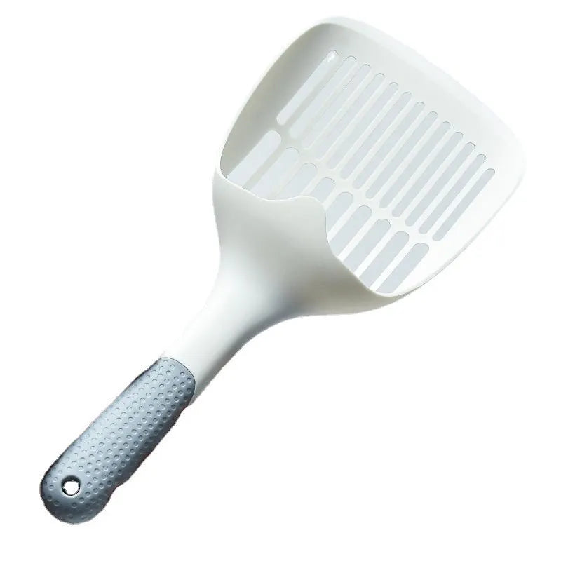 White plastic cat litter scoop with storage base for litter tray cleaning