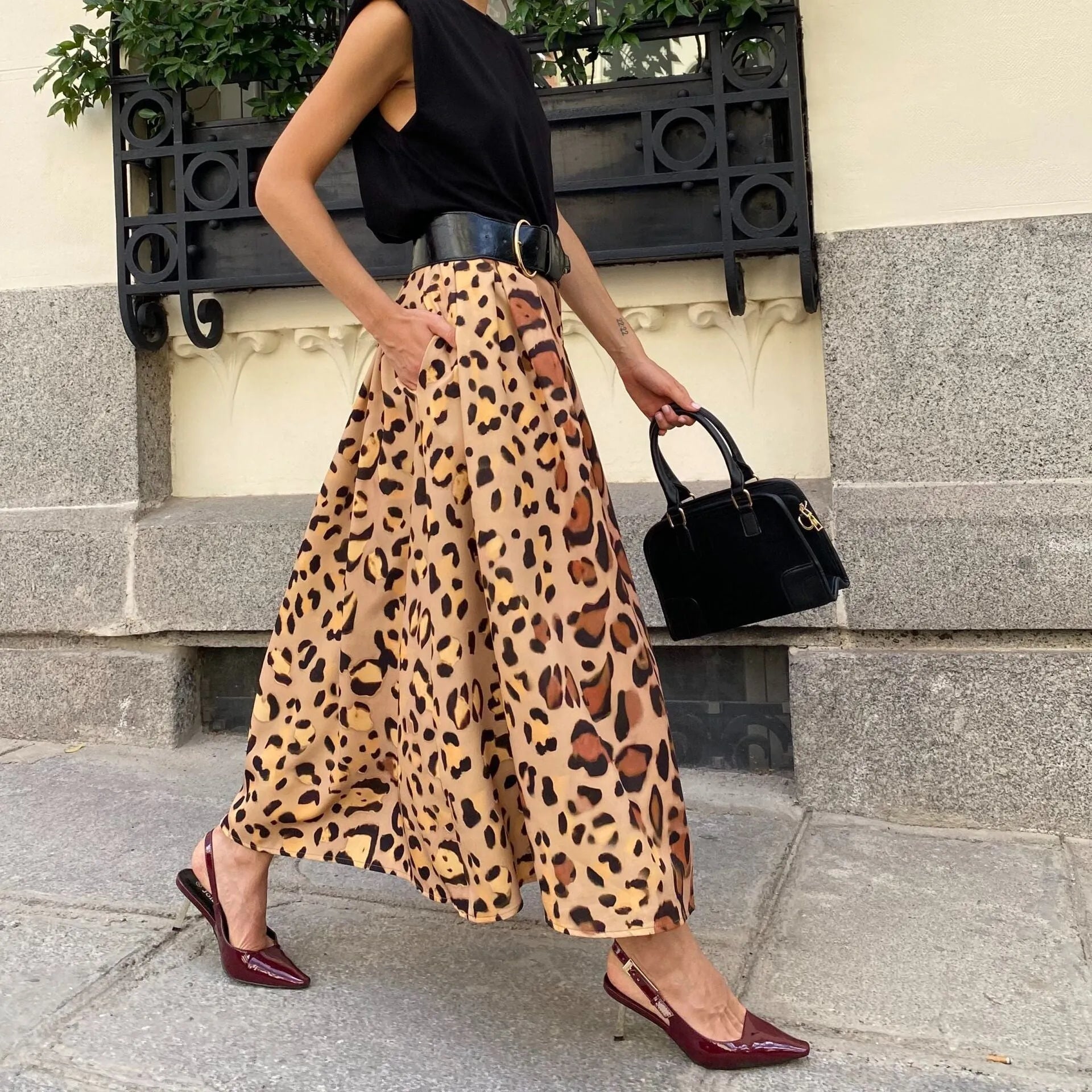 Brown leopard print women's A-line long skirt with an elasticated waistband.