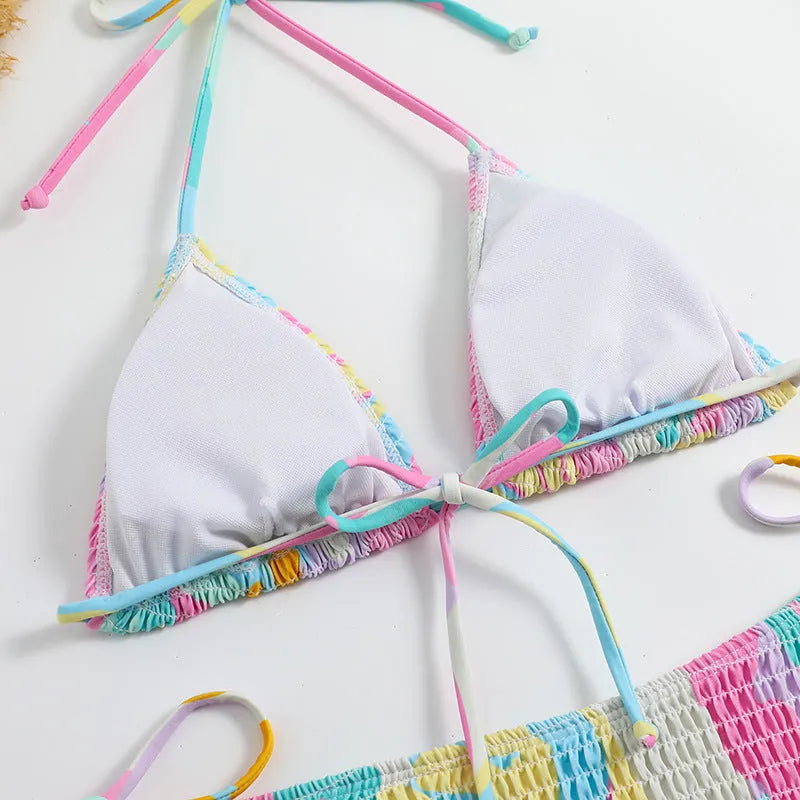 Women's triangle bikini swimsuit with floral gradient pattern and smocking craft detailing