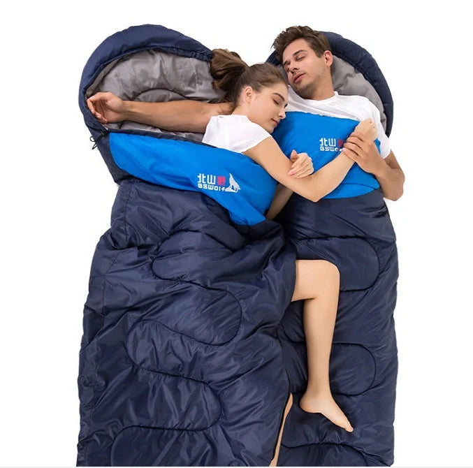 Blue camping sleeping bag with removable inner liner, compression straps, and waterproof 190T polyester shell