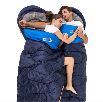 Blue camping sleeping bag with removable inner liner, compression straps, and waterproof 190T polyester shell