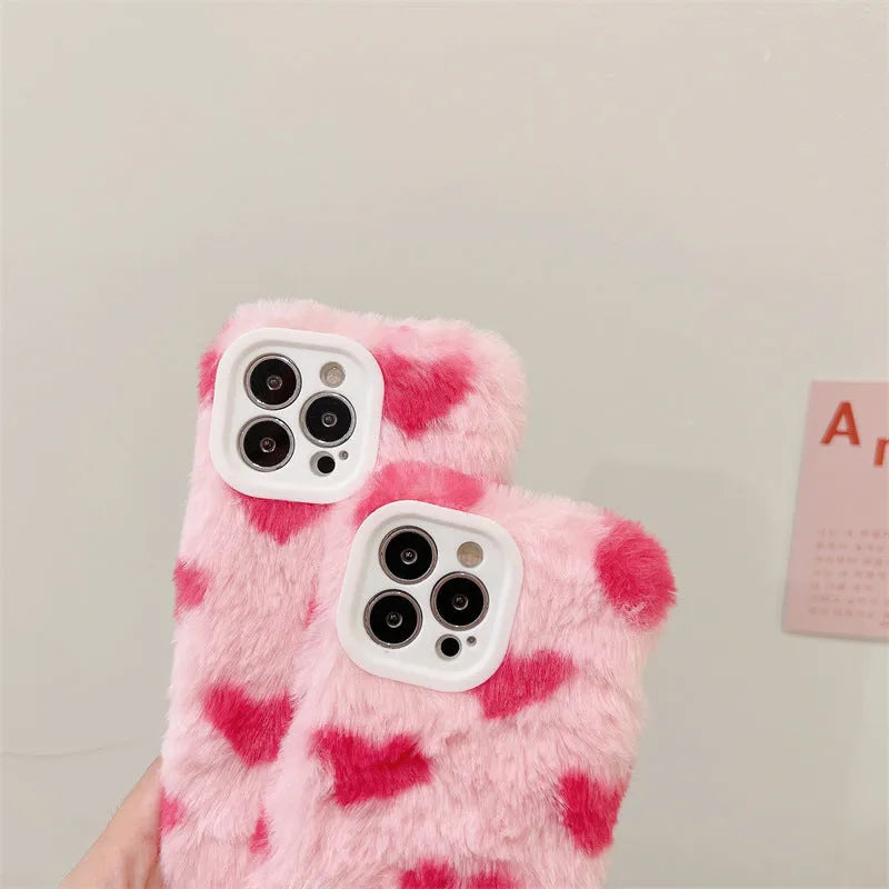Pink silicone phone case with a cartoon design, shown fitted on an Apple iPhone.