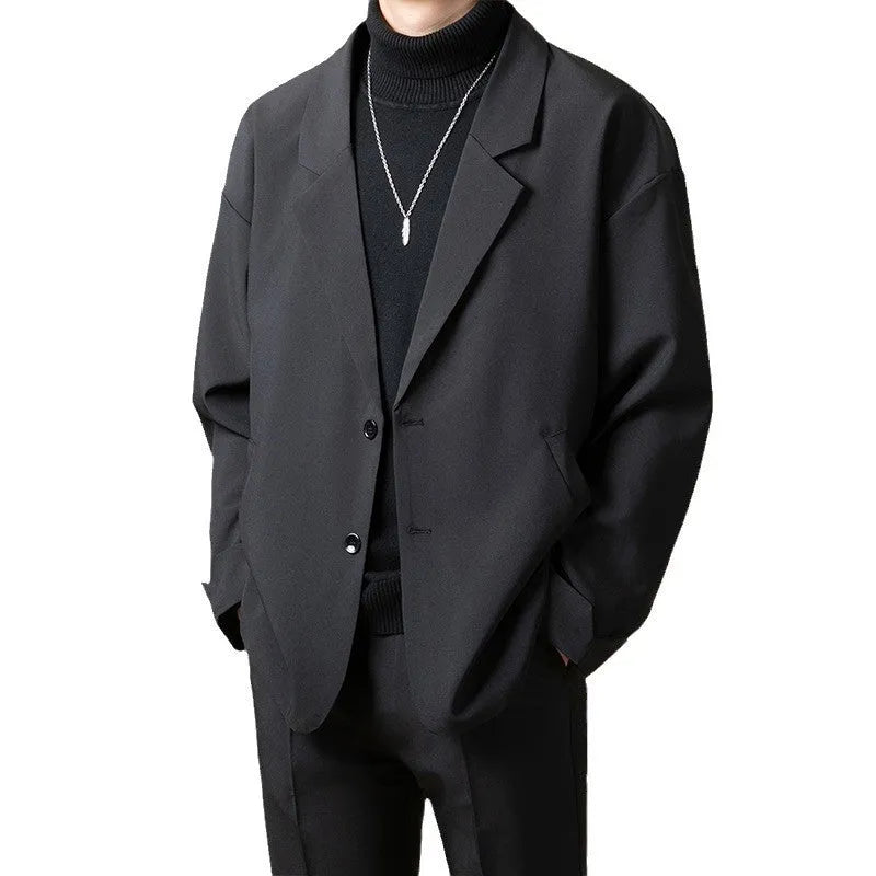 Loose casual suit jacket in polyester blend fabric available in four colours