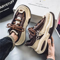 Men's casual sports waterproof dad shoes in solid colour with platform rubber sole and leather stitching