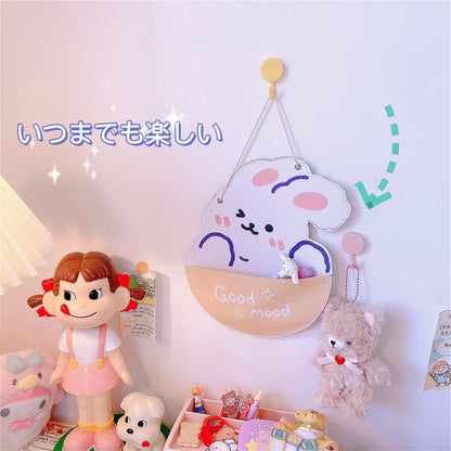 Wall hanging storage bag in beige bear and yellow rabbit designs, 22.5cm by 35cm