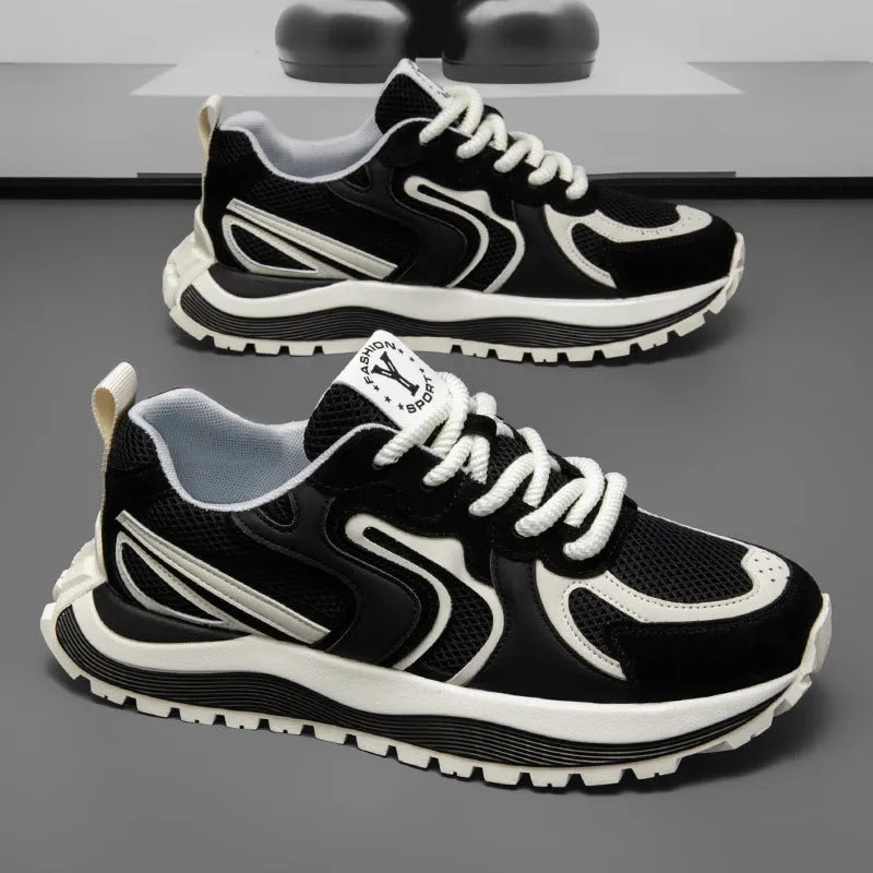 Men's black casual sneakers with mesh detail, round toe, and rubber sole