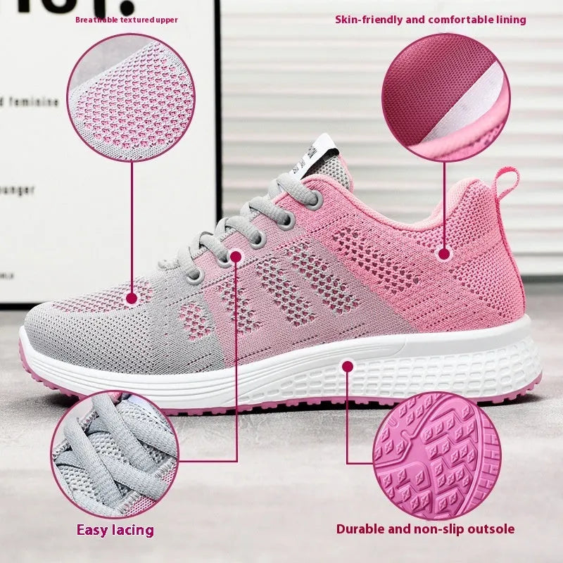 Women's black flyknit casual running shoes with white soft sole and flat heel on a grey background.