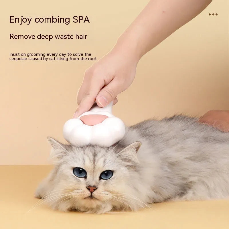 White plastic pet comb with one-click hair removal and massage feature for cat grooming