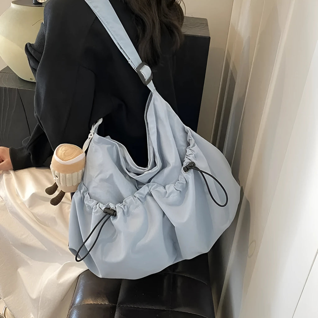 Ultra-light pleated crossbody student cloth bag in polyester with folding design and internal phone compartment
