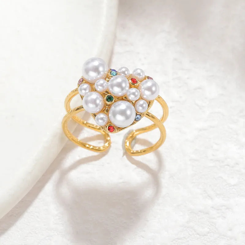 Open-mouth women's ring with pearl centre and zircon detailing on stainless steel band