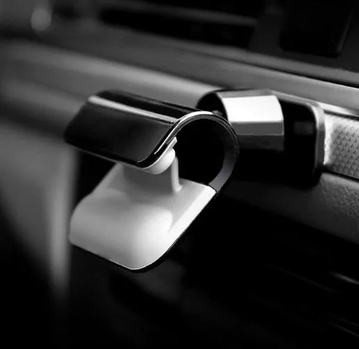 Black car phone holder showing 360-degree rotation mechanism for 4-7 inch mobile phones