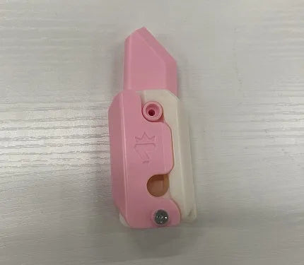 3D printed carrot gravity fidget knife in orange purple green colour, showing blade partly extended from sheath