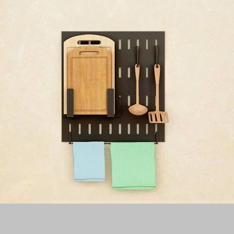 Wall-mounted stainless steel kitchen organiser with multiple storage compartments and hooks