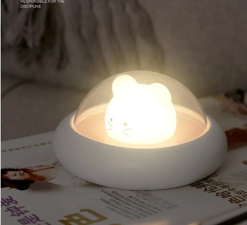 USB LED night light with touch control, blue colour, compact 12x12x6.5cm size on bedside table