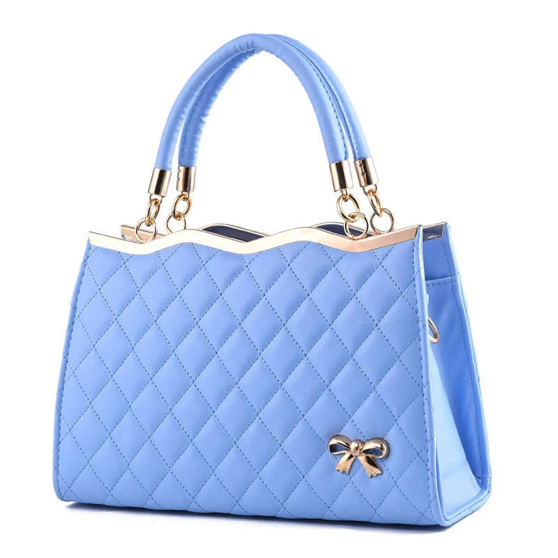Crossbody shoulder bag with decorative bow in various colors, made from PU leather