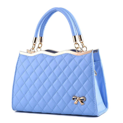 Crossbody shoulder bag with decorative bow in various colors, made from PU leather