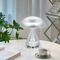 Small white USB rechargeable touch night lamp with three colour changing LED light.