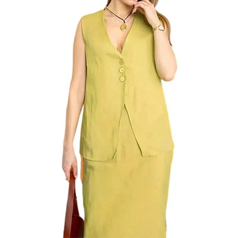 White sleeveless top and long skirt two-piece casual suit set on a model.