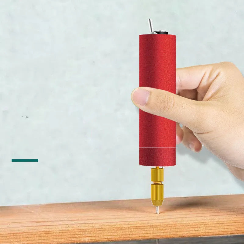 Aluminium USB mini grinder with three small drill bits and a wrench on a white background.