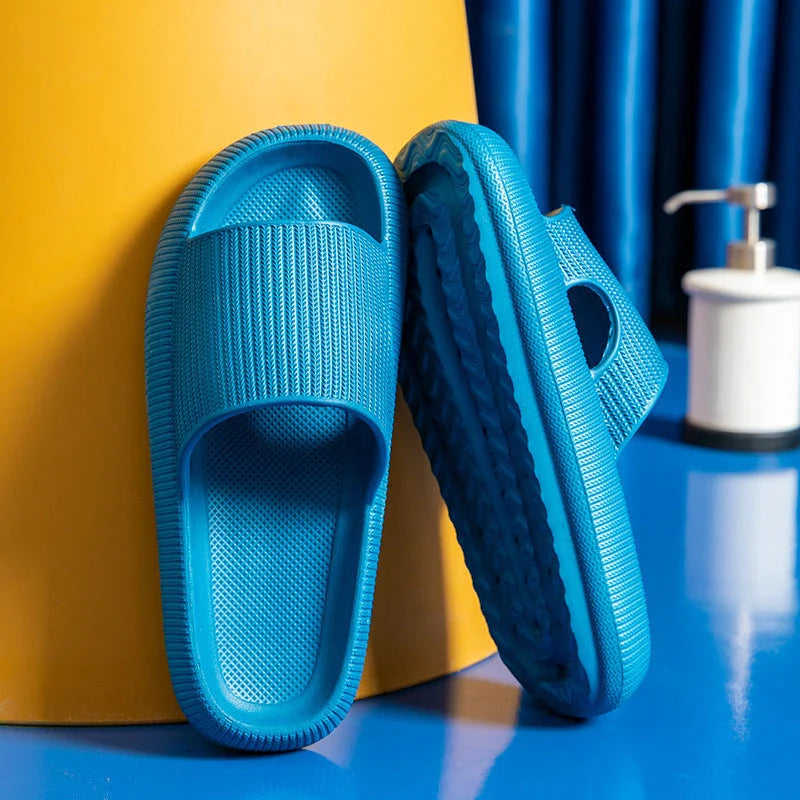 Stylish and comfortable EVA bathroom slippers with soft cushioned soles and anti-slip design, available in a variety of vibrant colors.