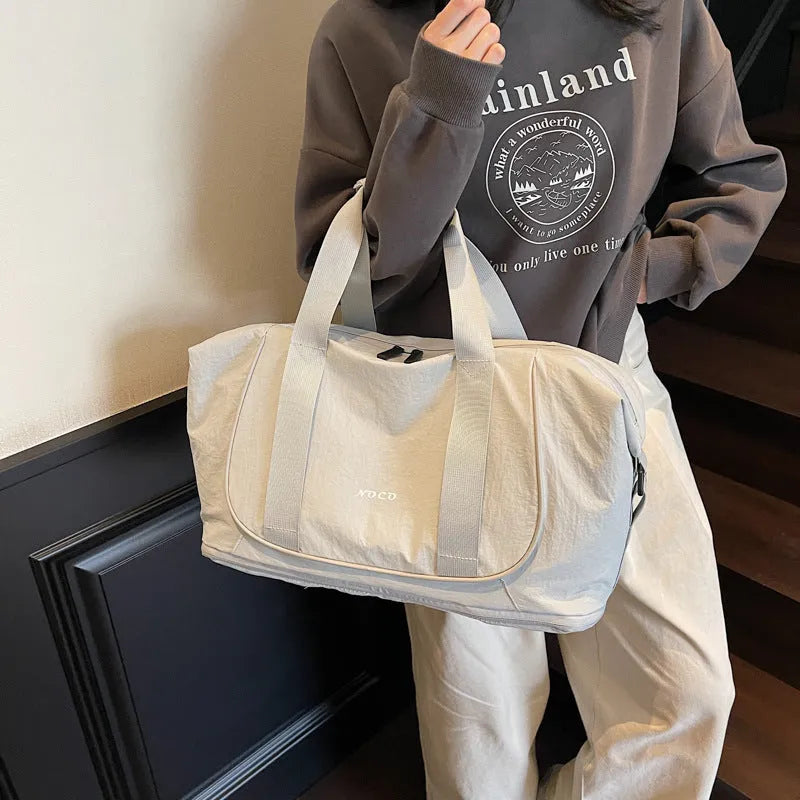 Oxford cloth one shoulder crossbody bag in beige, shown for yoga or travel use
