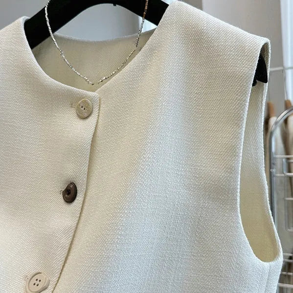 Women's French-style polyester bandage vest dress in milky white colour with round neck and sleeveless design