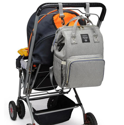 A stylish and practical mummy backpack with features like an insulated bottle compartment, USB charging port, and water-resistant construction.