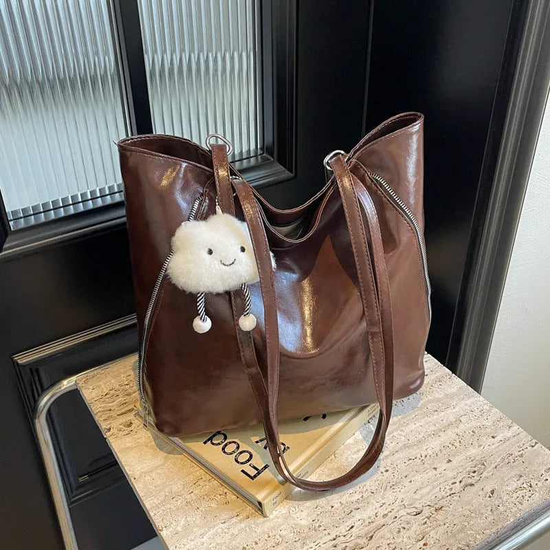 Women's large capacity PU oil leather tote bag with double zipper and sewing thread detail in four colour options
