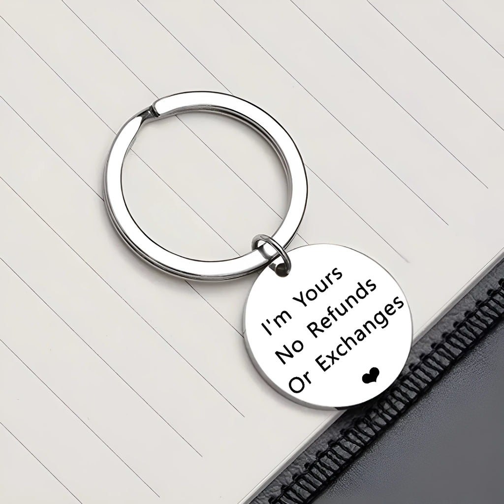 Titanium steel keychain 30mm width unisex design steel colour finish on white background