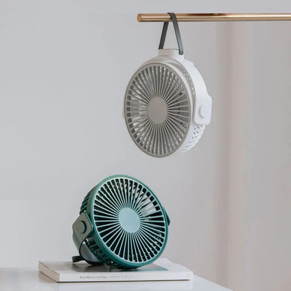 Versatile USB desk fan with 4 wind speed settings, 360-degree adjustable airflow, and long-lasting battery for powerful, portable, and eco-friendly cooling.