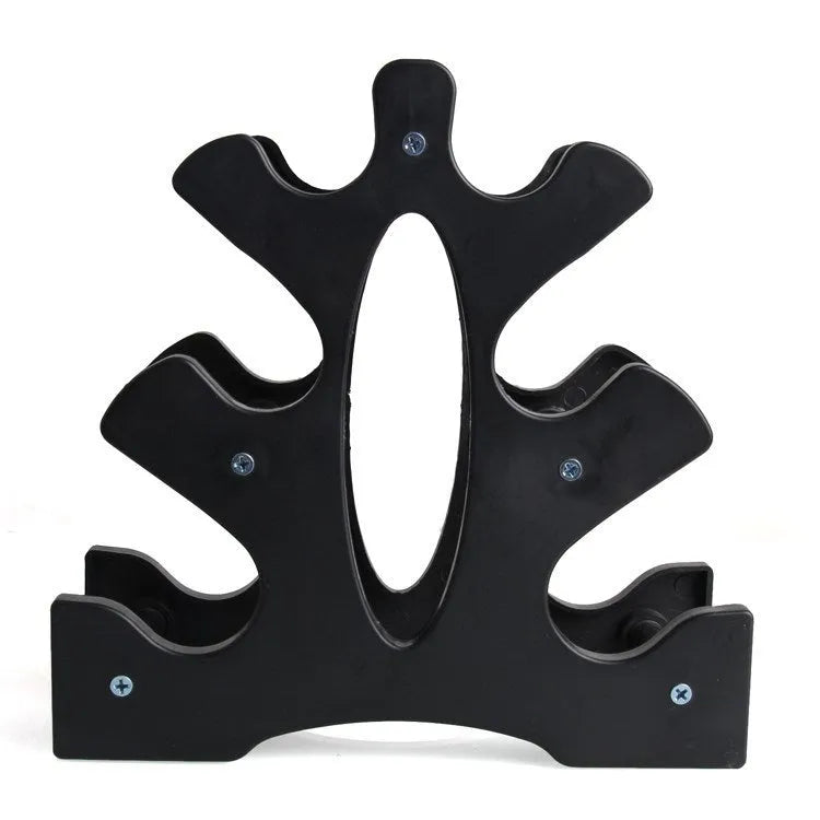 PVC freestanding dumbbell rack bracket holding multiple weights on a gym floor.