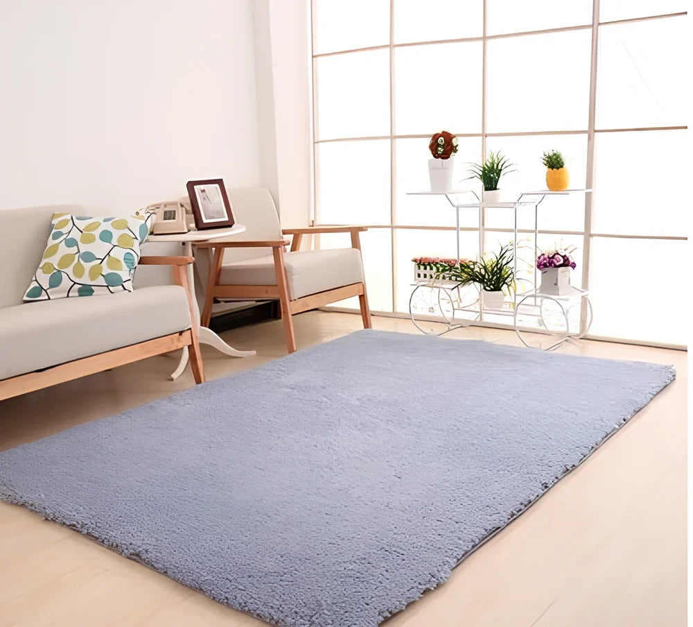 White plush solid rectangle area rug with non-slip dotted base, 100x160cm size, three-layer velvet and sponge construction for home floors