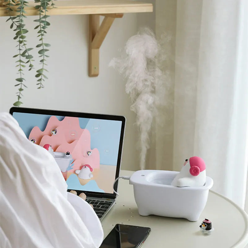 White USB air humidifier with 550ml water tank on desk