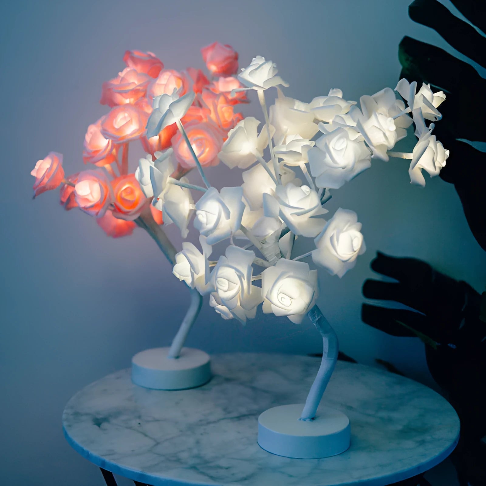 White and red rose flower LED table lamp with warm white lights on wooden surface