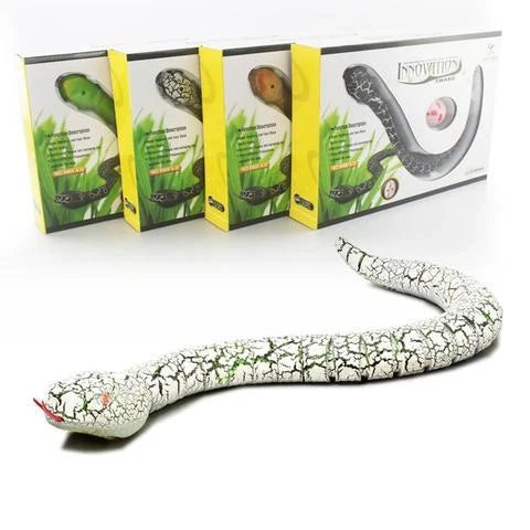Remote control rattlesnake toy with realistic slithering motion and egg-shaped controller