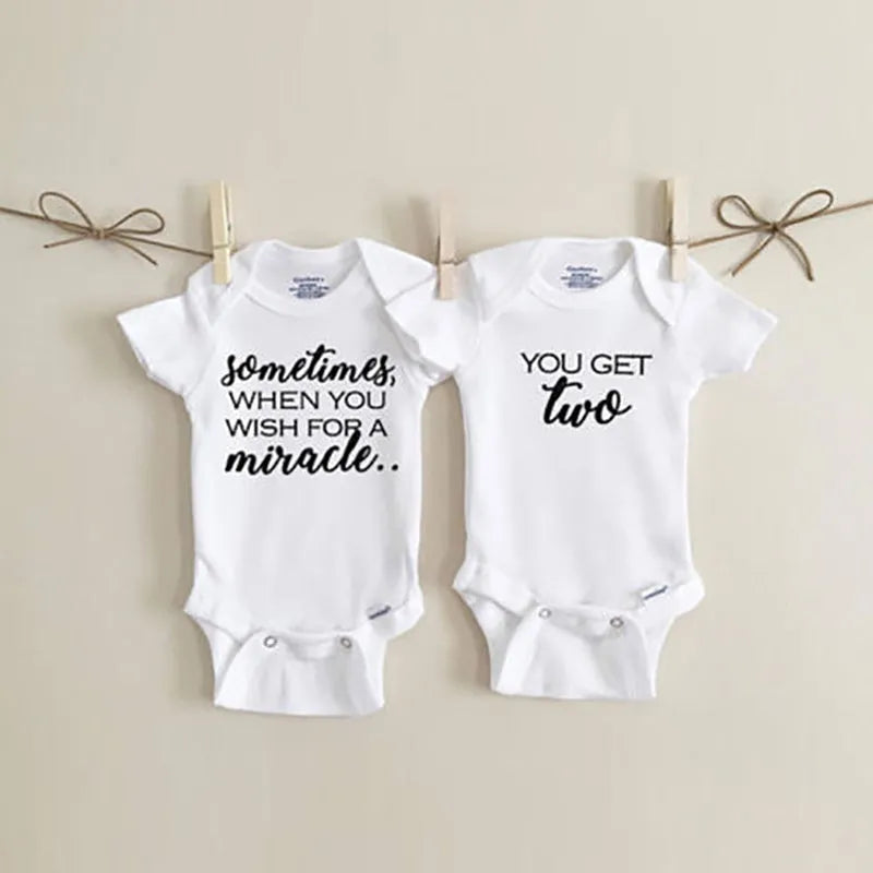 White baby jumpsuit romper with elasticated fit for infants and toddlers, sizes S to 3XL