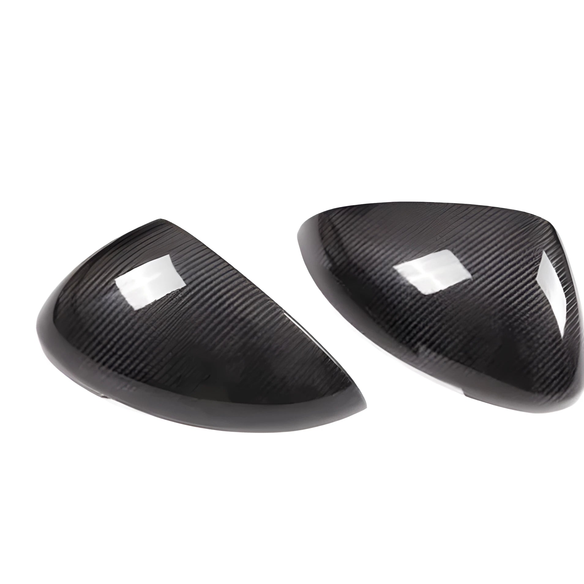 True carbon fibre exterior mirror covers for a Porsche Macan, shown in high-gloss black.
