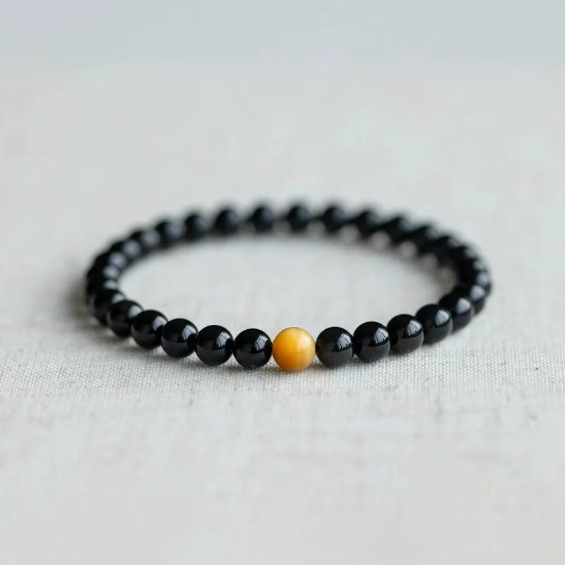 Black obsidian geometric bead bracelet in Korean style, showing 6mm, 8mm and 10mm size options.